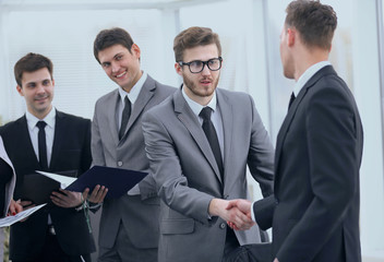 Fototapeta premium welcome and handshake of business partners on the briefing