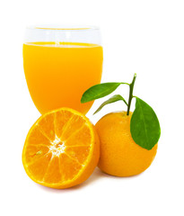 Orange juice in glass and orange fruit slice half