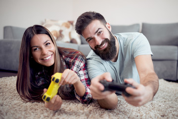 Fototapeta premium Couple playing video game