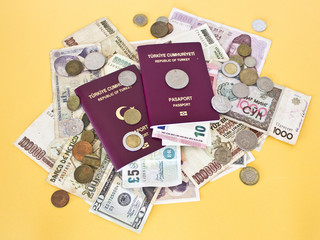 Fototapeta na wymiar Foreign passports and money from different countries