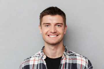 Close up portrait of a smiling young man