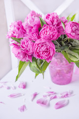 A beautiful bouquet of pink peonies. Bright, gentle interior.
