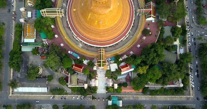 4K. Flying over Phra Pathom Chedi, the great golden pagoda and world's tallest stupa in Nakhon Pathom, Southeast Asia, Thailand