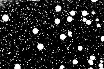 Dark Background with Big and Small Particles with dots