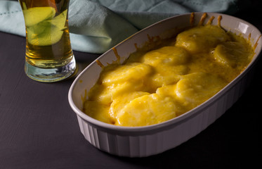 Cheesy potato bake with beer - pub food