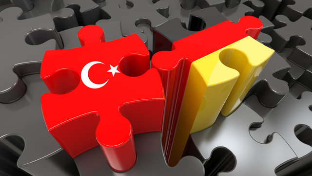 Turkey and Germany flags on puzzle pieces