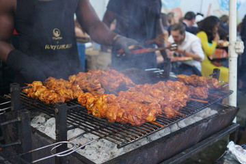 Grilling meat on barbecue