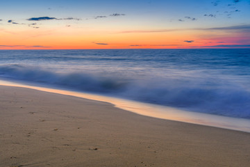 Morning glow of the sunrise over the ocean