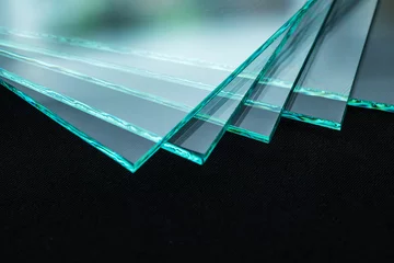 Fotobehang Sheets of Factory manufacturing tempered clear float glass panels cut to size © sichkarenko_com