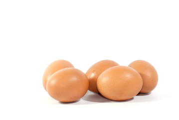 Brown big chicken eggs on white screen, suit for making ingredient photo