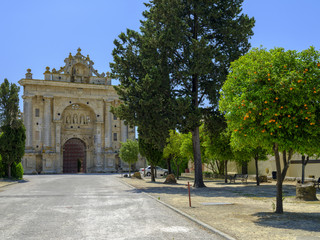 Fototapeta na wymiar View of front face of Monastery Cartuja de Santa Maria de la Defension de Jerez outside the town of Lomopardo, Andalucia, Spain