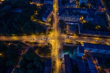 Aerial drone view on night street in Zabrze city.