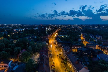 Aerial drone view on night street in Zabrze city. - obrazy, fototapety, plakaty