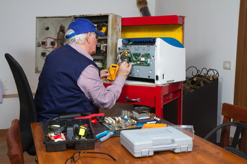 electrician fixing eletrical devices