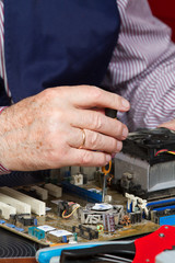 electrician fixing eletrical devices