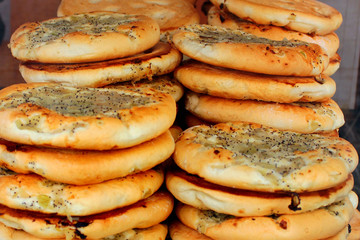 Street stall with cebularz, traditional Jewish dish in Lublin, Poland. © aquatarkus