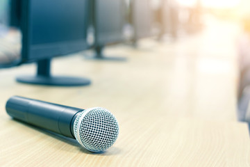 Microphone in conference on seminar room event background