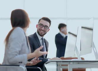 prospective employees are talking at their Desk