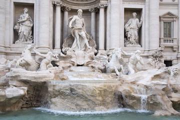 Fototapeta na wymiar The Trevi Fountain (Italian: Fontana di Trevi) is a fountain in the Trevi district in Rome, Italy, designed by Italian architect Nicola Salvi and completed by Giuseppe Pannini, in 1762.