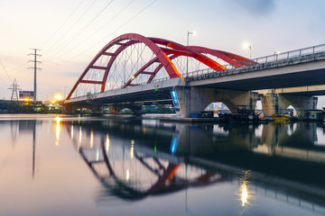 Naklejka premium Binh Loi Bridge in sunrise