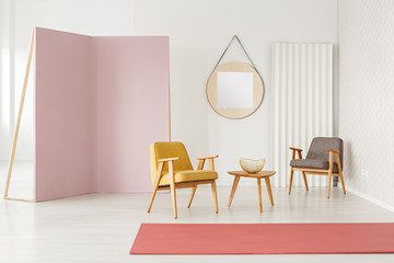 Fototapeta premium Spacious pink living room interior