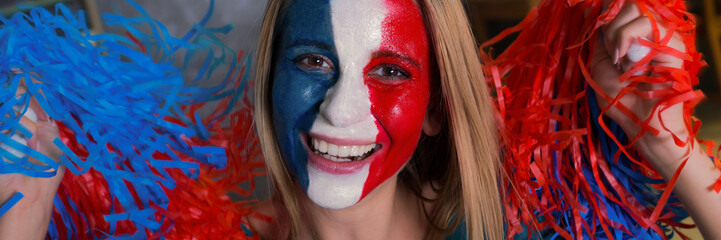 Happy female French fan cheering