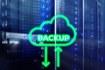 Backup button on modern server room background. Data loss prevention. System recovery. 