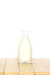 Milk bottle on white background