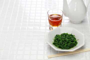 chinese white wine stir fried with toothed bur clover, shanghai cuisine
