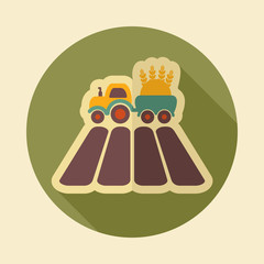 Tractor on field flat icon