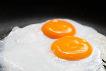 Fried eggs in pan delicious healthy easy breakfast