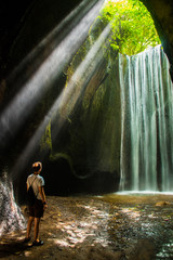 Secret beautiful tukad waterfall in canyon, Bali, Indonesia