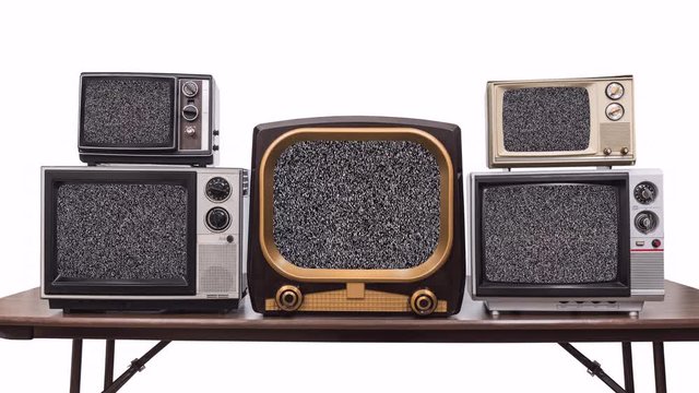 Five vintage televisions on white with dissolve to static and chroma key green screens.