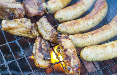grilled sausages on the grill