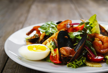 Seafood salad close up, free space. Mediterranean food, restaurant menu, appetizer, banquet dining concept