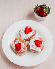 cottage cheese pancakes with strawberry on white table background. Breakfast or Lunch Concept. Top view