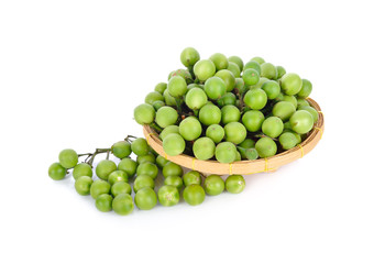 fresh pea eggplant in bamboo basket and on white background