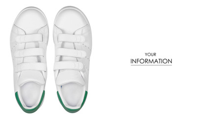 White leather female sneakers shoes on laces pattern on white background isolation, top view
