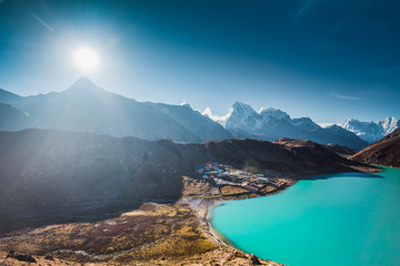 The spectacular sunset in the Himalays. Stunning panoramic view the mighty mountains and Gokyo Lake. Everest Base Camp trek in the Sagarmatha National Park in the north-eastern Nepal.