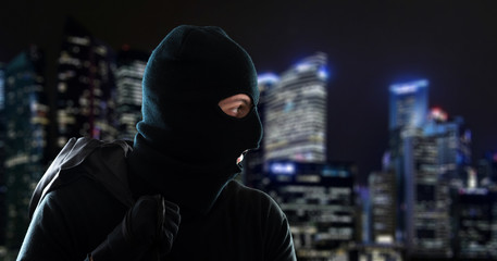Thief escaping in the night