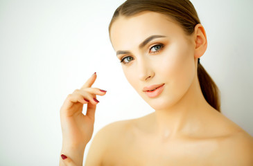 Perfect Young Model Woman with Healthy Skin, Shiny Hair and Manicured Hands on Background. Young...