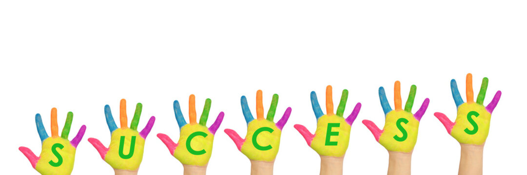 The word "success", the writing on the palms painted colorful hands.