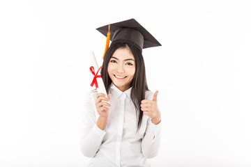 Beautiful Attractive Graduated Asian woman in cap holding certificated and showing thumbs up good hand sign feeling so proud and happiness,Isolated on white background,Education Success concept