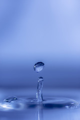 figure three of the result of the shock of a drop of water, forming a water column