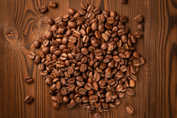 Roasted Coffee Beans (Arabica) In A Wooden Board. Top View. Background Series.