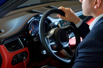 Fototapeta premium transport, business trip, destination and people concept - young man driving car