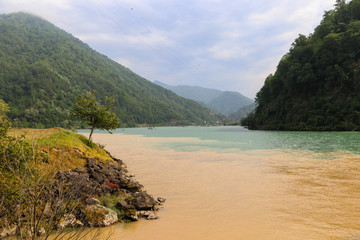 View of confluence of two mountain rivers Adjaristskali and Chorokh in Adjara, Georgia