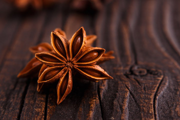 anise stars on a dark rustic background