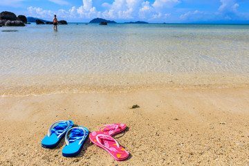 Fototapeta na wymiar Sandals on the beach in Koh Mak island, Trat province,Thailand.