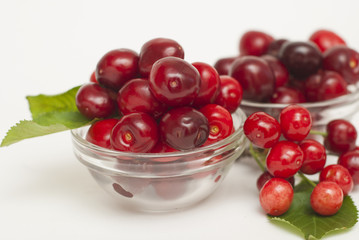 Cherries. Cherry. Cherries in color bowl and kitchen napkin. Red cherry. Fresh cherries. Cherry on white background. healthy food concept
